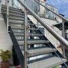 Tough Decking Stone Grey Boards & Wide Groove Step Nosing - Fixed To Metal Steps With CT1 - No Risers